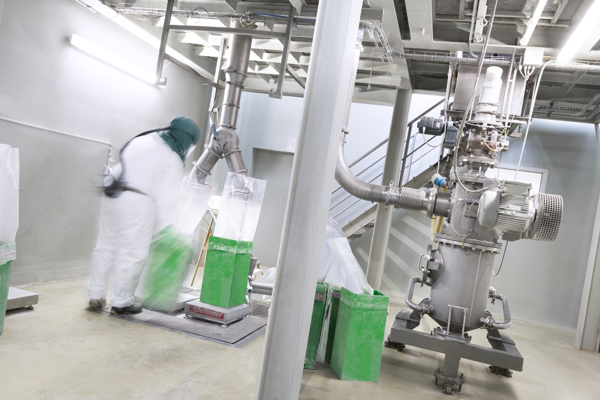 Employee filling the product into carton